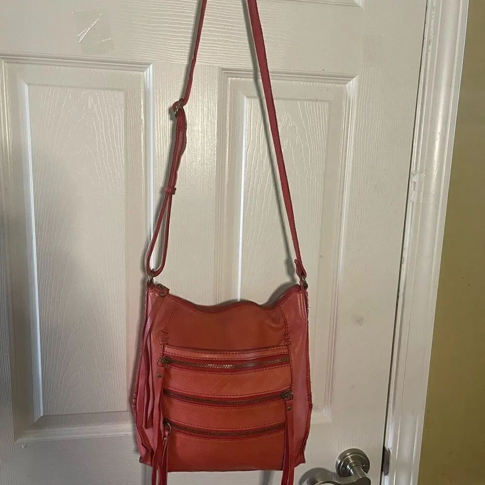 Lucky Brand leather orange Bohemian style crossbo bag antique tone hardwares .